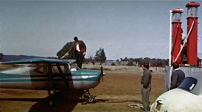 Robin Jelliffe filling a Cessna 150, 1964