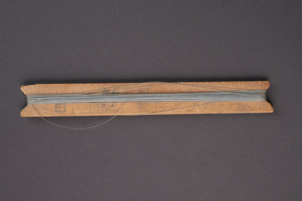 School ruler converted into a fishing reel
