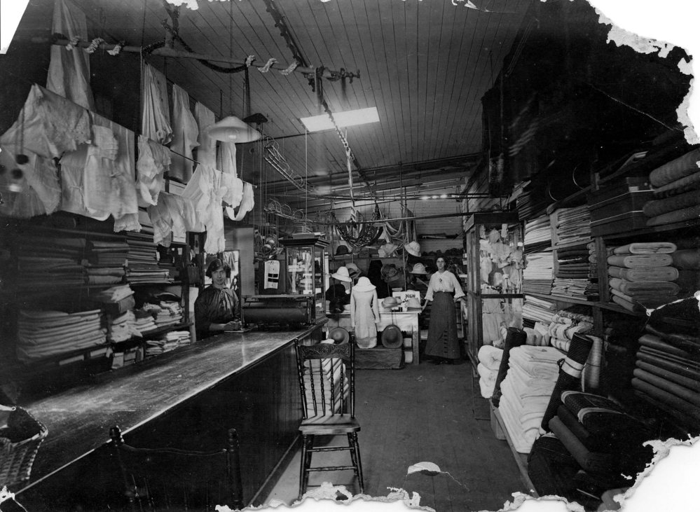 Shop assistants inside Brays General Store