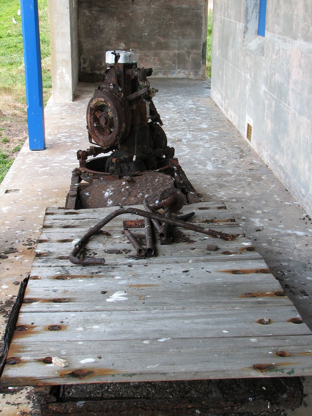 Rusting machinery on verandah, South Solitary Island, 2007