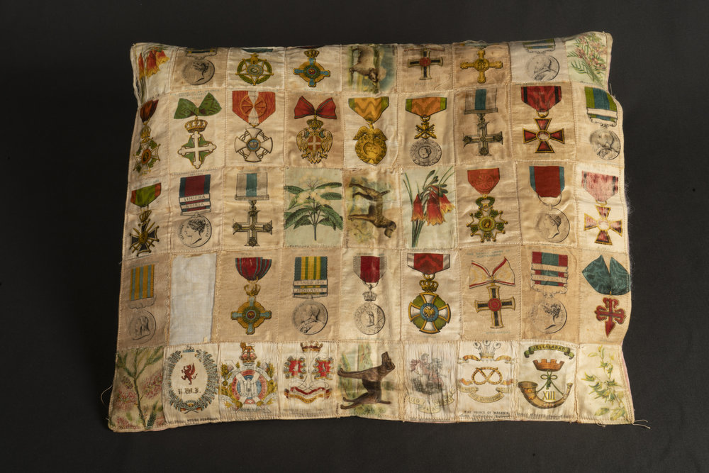 Cushion cover made of silk cigarette cards