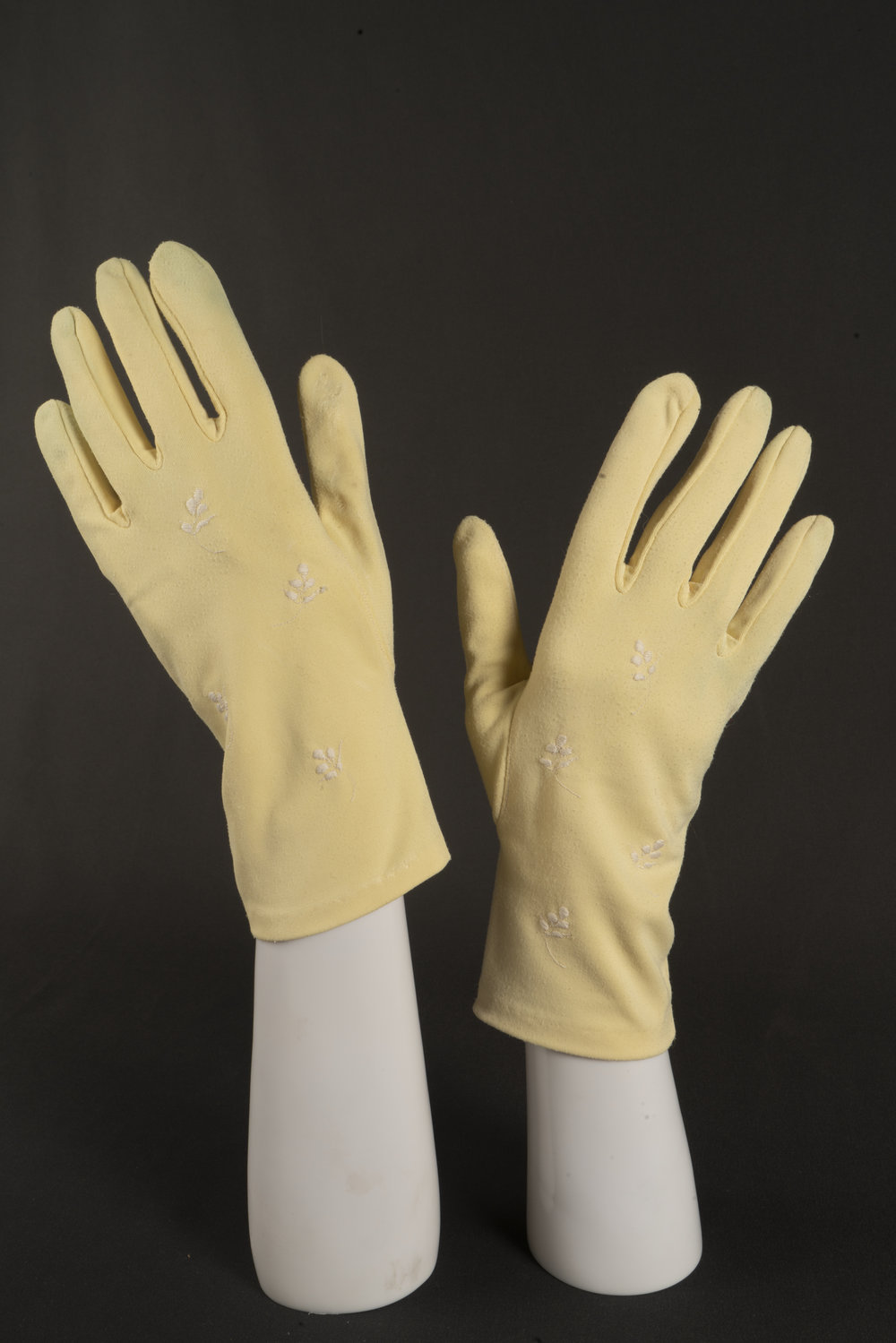Pair of yellow embroidered gloves