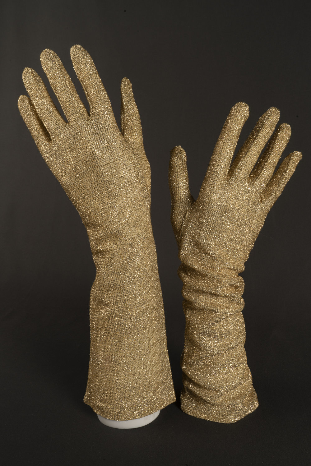 Pair of gold lurex evening gloves