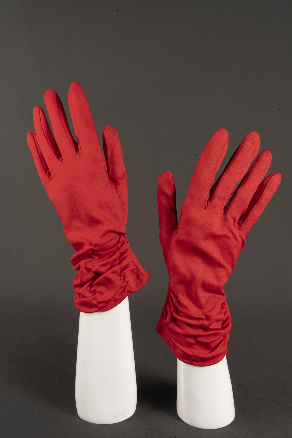 Pair of red nylon gloves