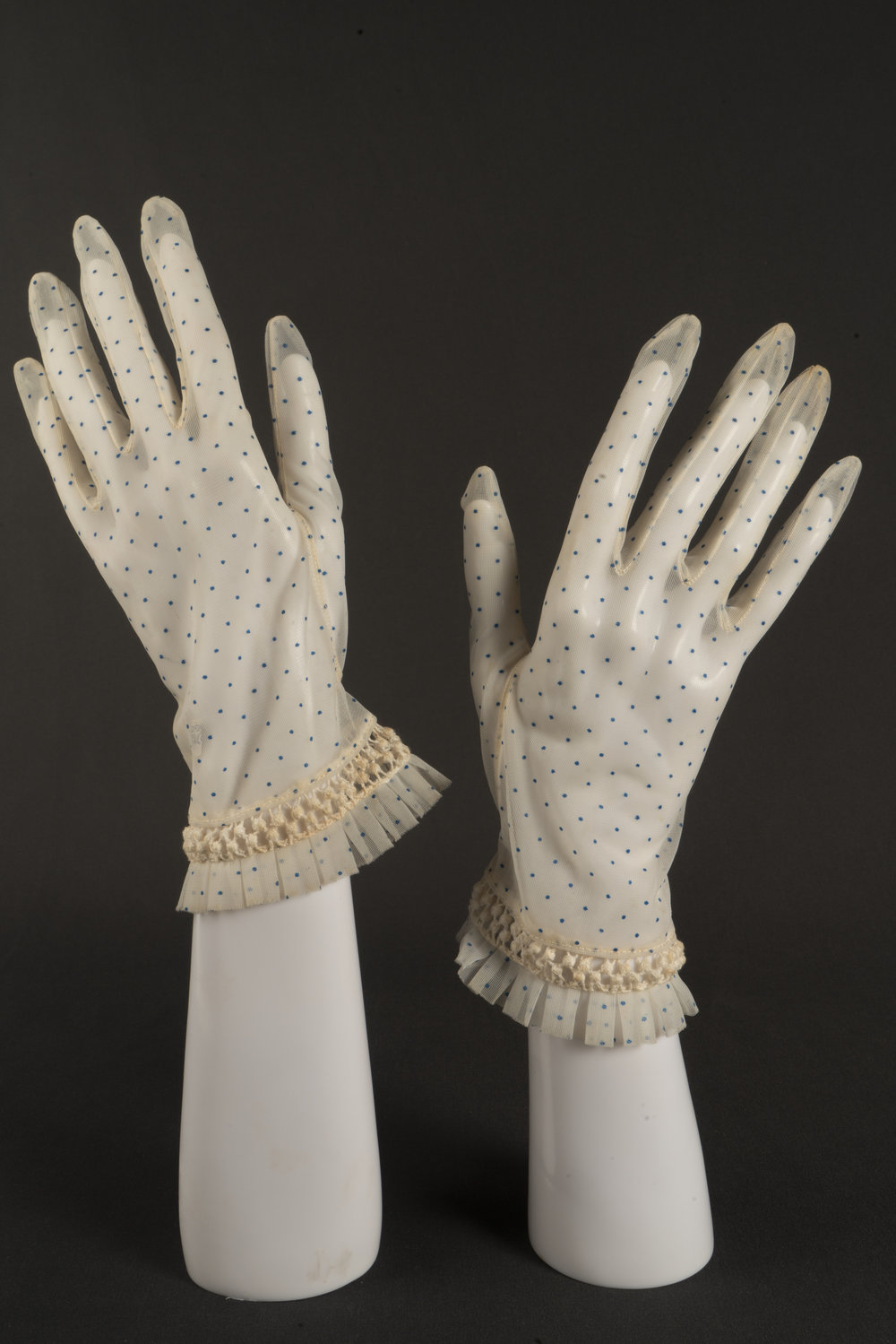 Pair of cream &amp; blue hail spot gloves