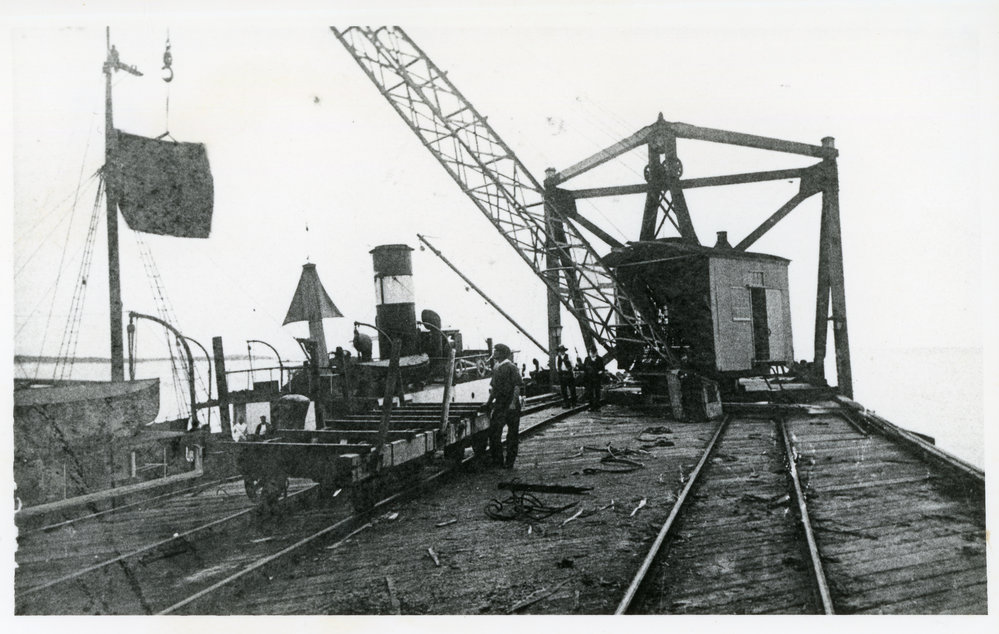 Loading timber at Woolgoolga Jetty, early 1900s
