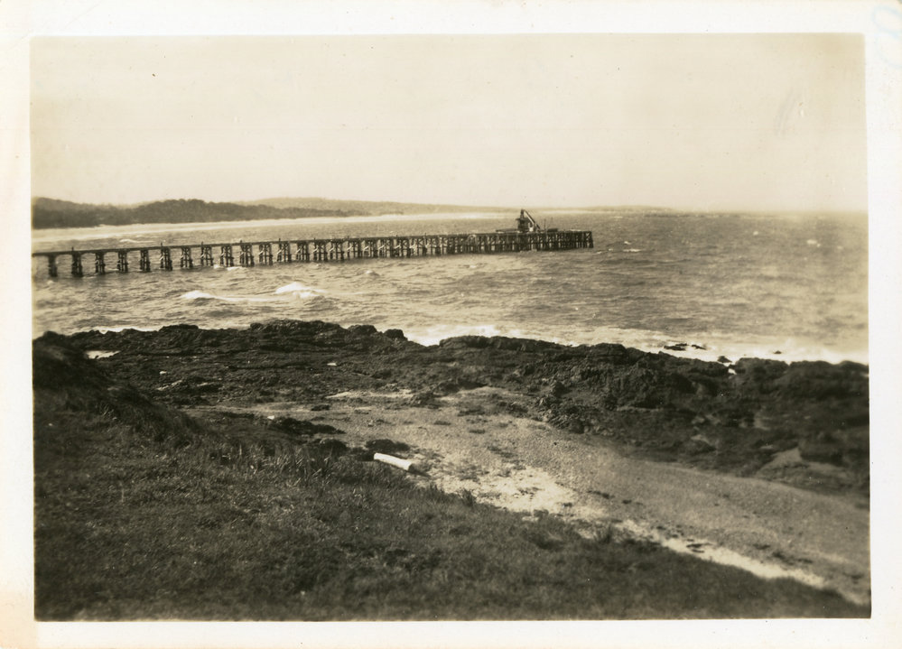 View of Woolgoolga Jetty from Yellowtail Rocks, February 1945