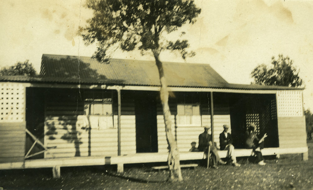 3 men on verandah of house, Red Rock 194