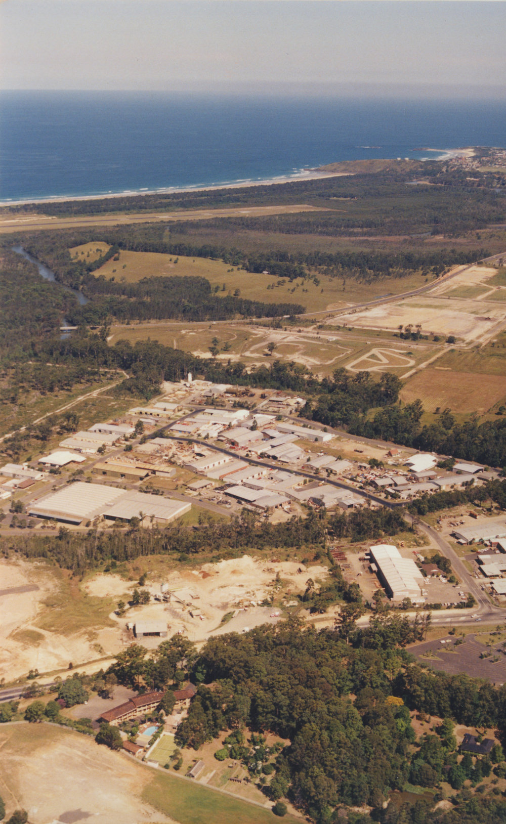 Aerial view of Cook Drive industrial estate in Coffs Harbour, 1990s