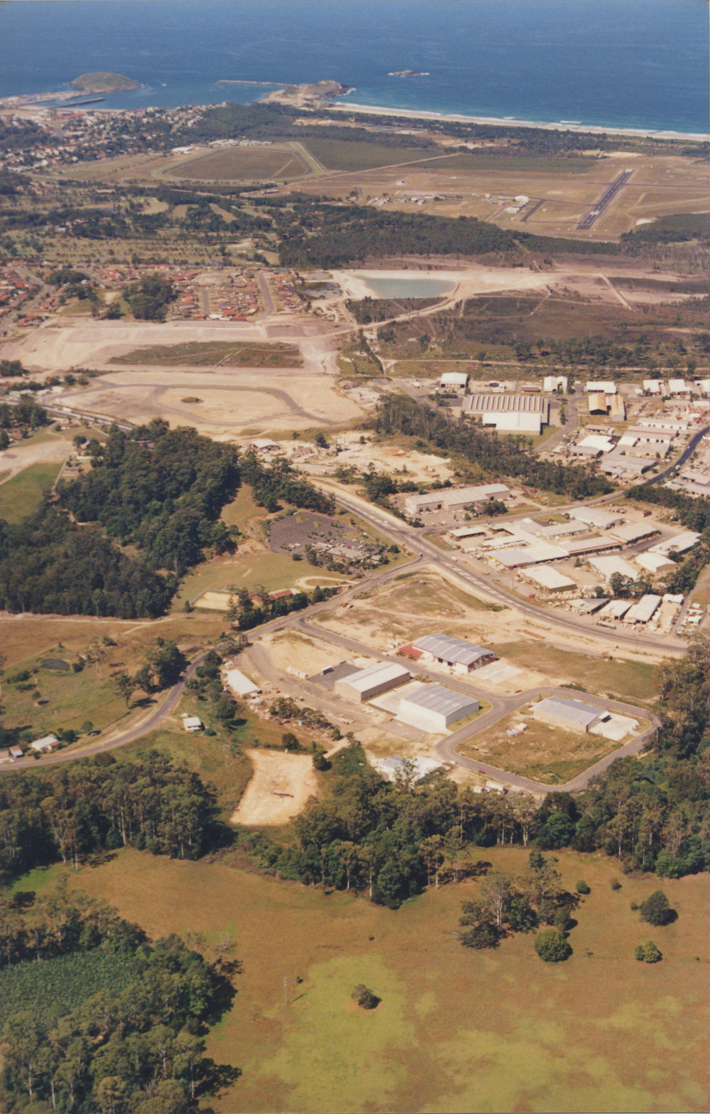 Aerial view of industrial estates in Coffs Harbour, 1990s