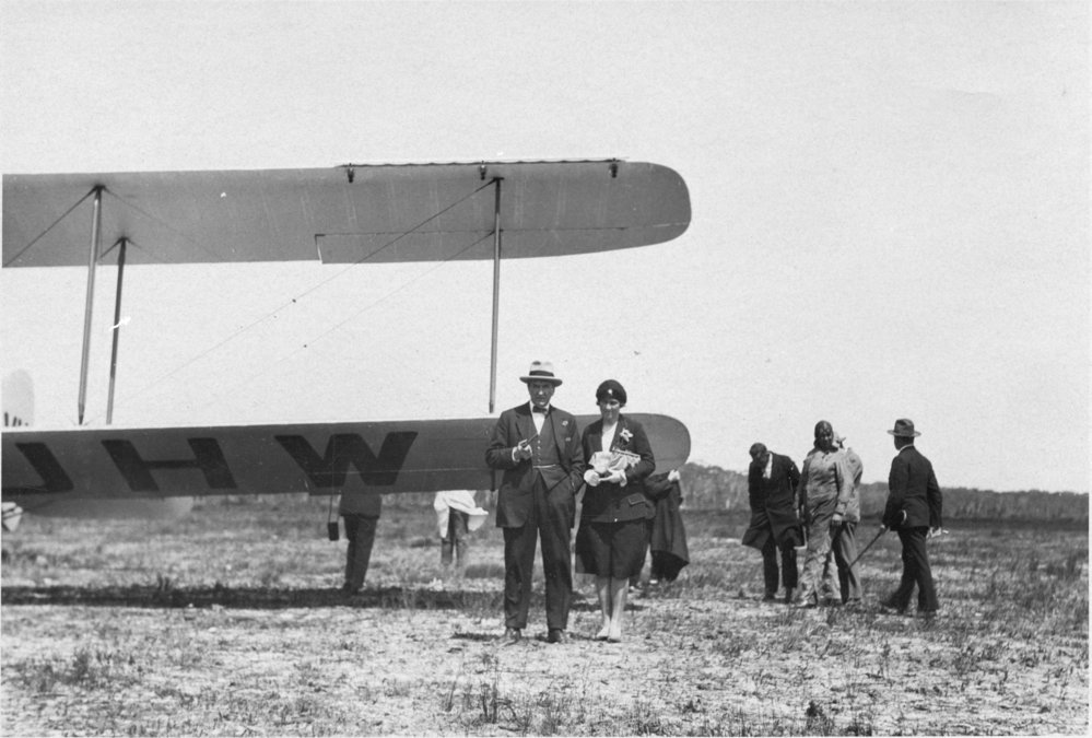 The Prime Minister Stanley Bruce and his wife Ethel with the bi-plane 'Canberra', 22 September 1929 