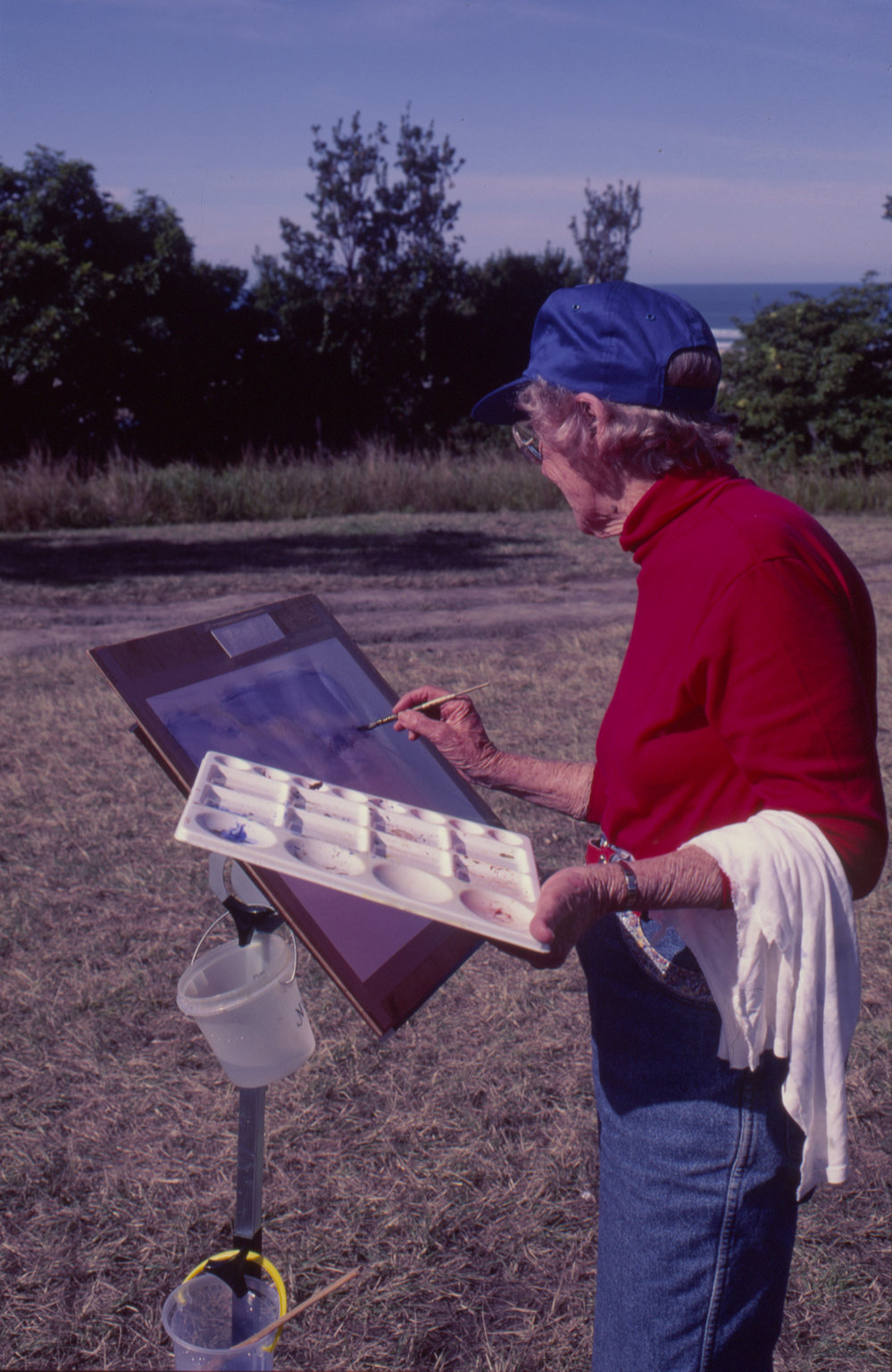 Painting 'en plein air' by the beach