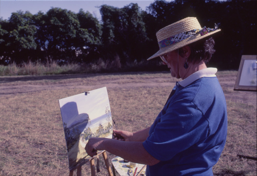 Painting 'en plein air' by the beach