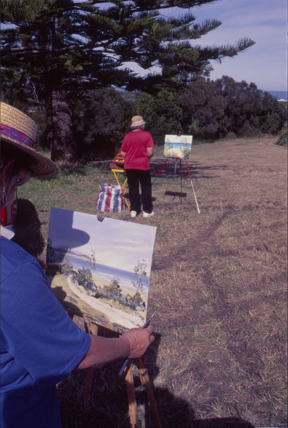 Painting 'en plein air' by the beach