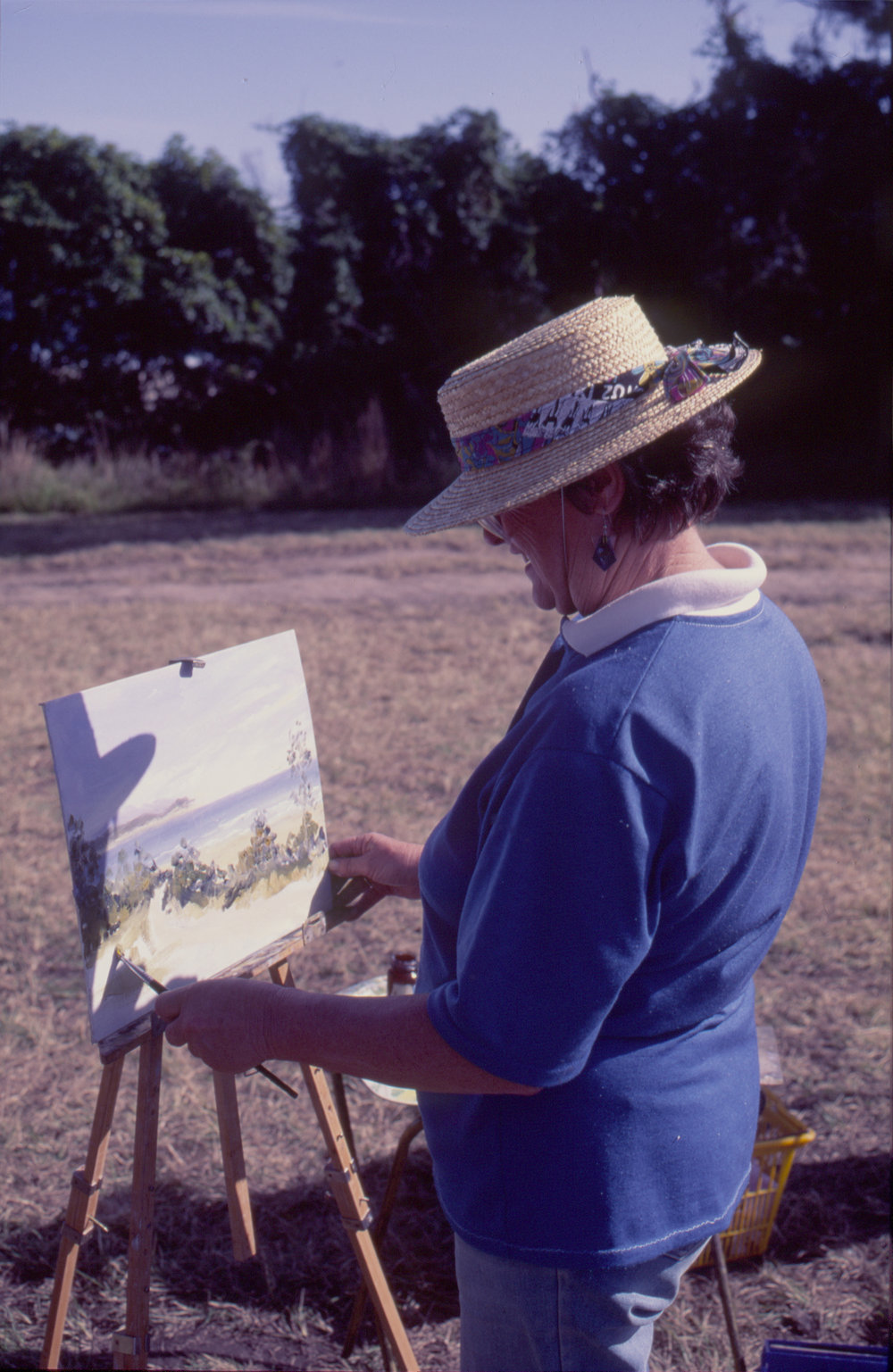 Painting 'en plein air' by the beach