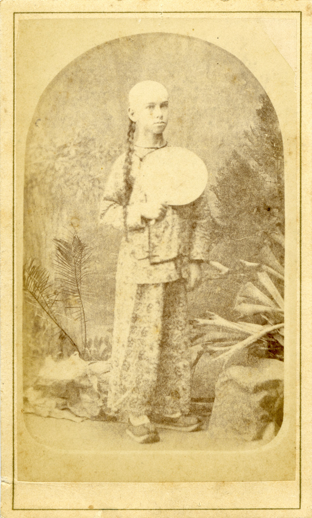 Portrait of a young man in Chinese costume, c.1878