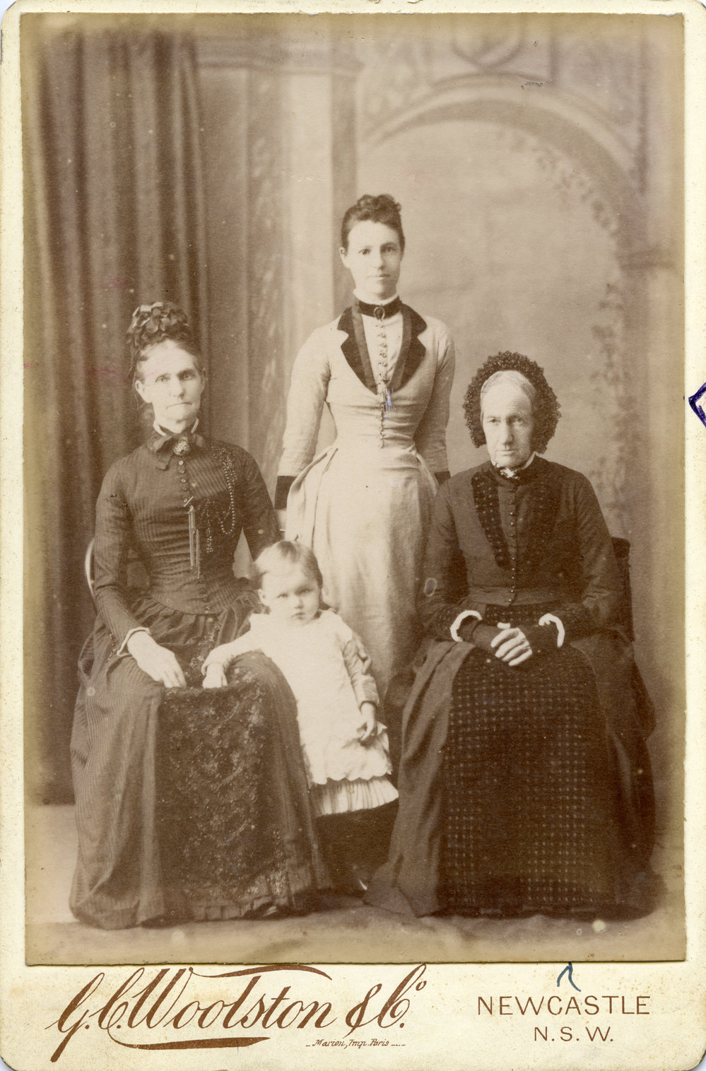Portrait of three women and a toddler, c. 1885
