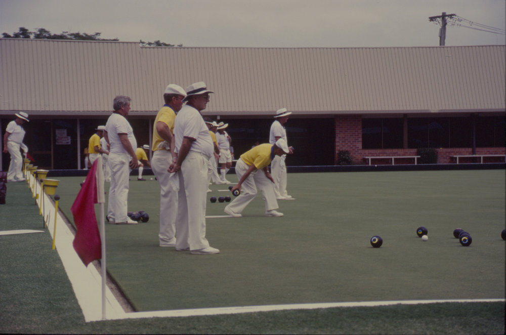Men playing lawn bowls