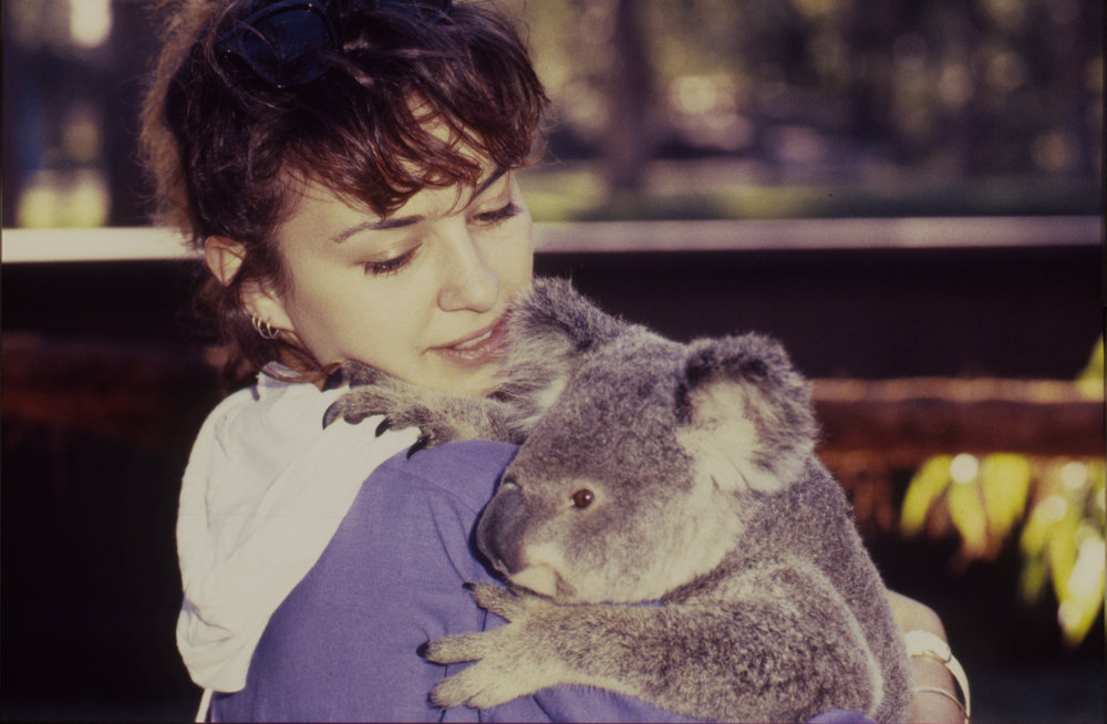 Woman holding koala