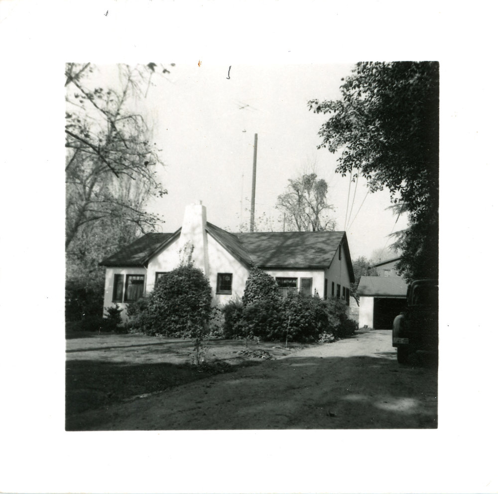 Cottage with TV antenna, c. 1950s