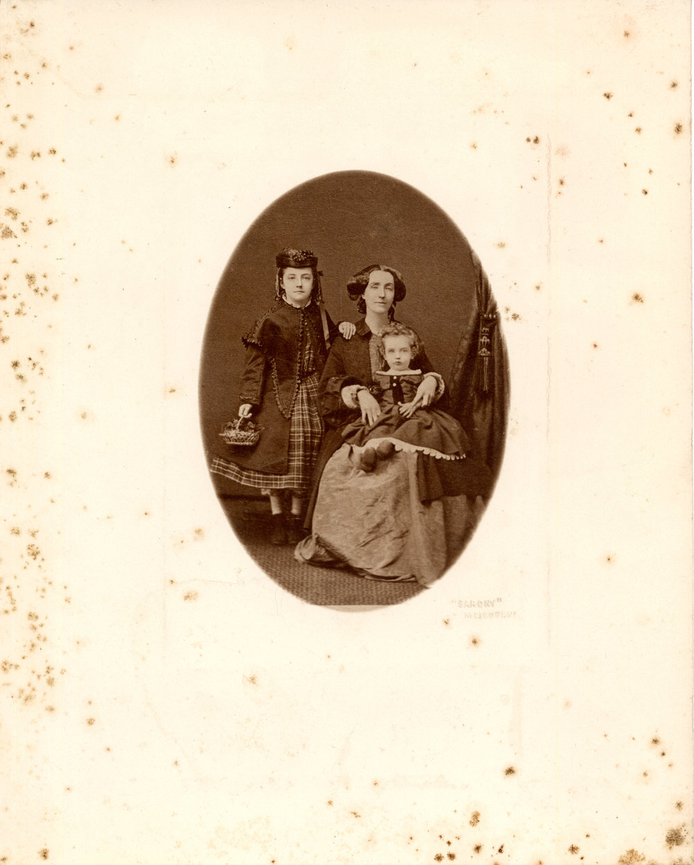 Family of three, c. 1890s