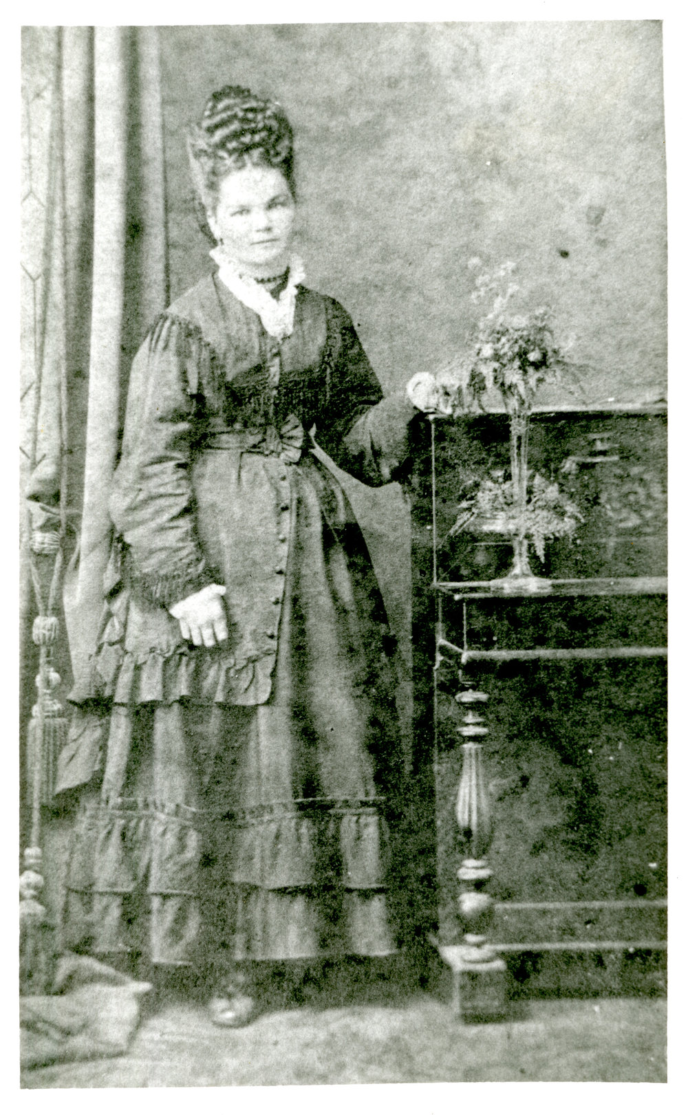 Portrait of a woman with piano, c. 1890