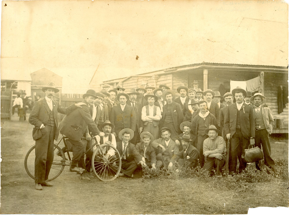 A group of cyclists and supporters