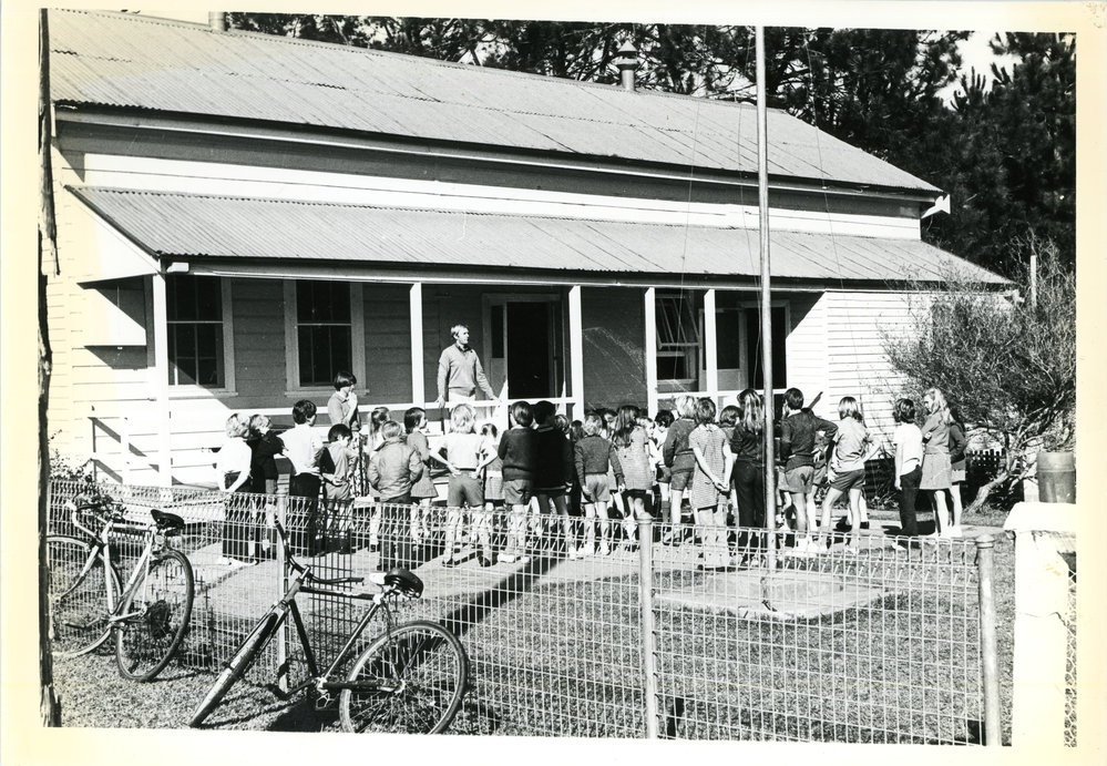 Principal George Gelagin and Assistant Teacher Robyn Rowe at Upper Orara Primary School assembly, 1978 
