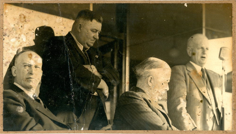Harry Bailey listens to proceedings at the opening of the new B. G. F. building, 30 August 1951