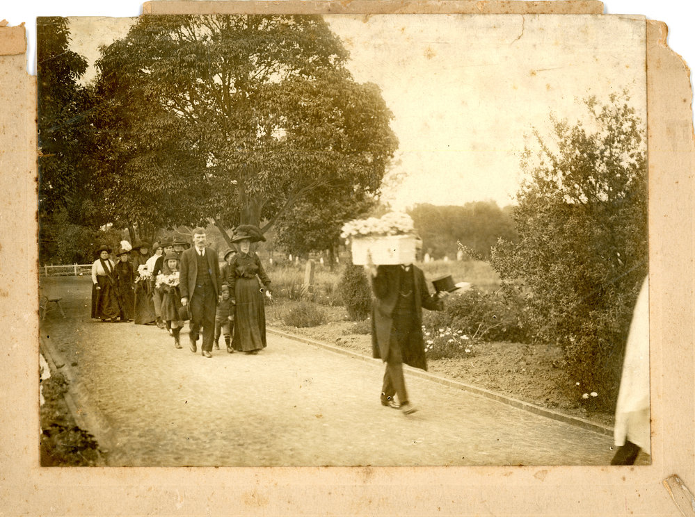 A small procession for a child's funeral