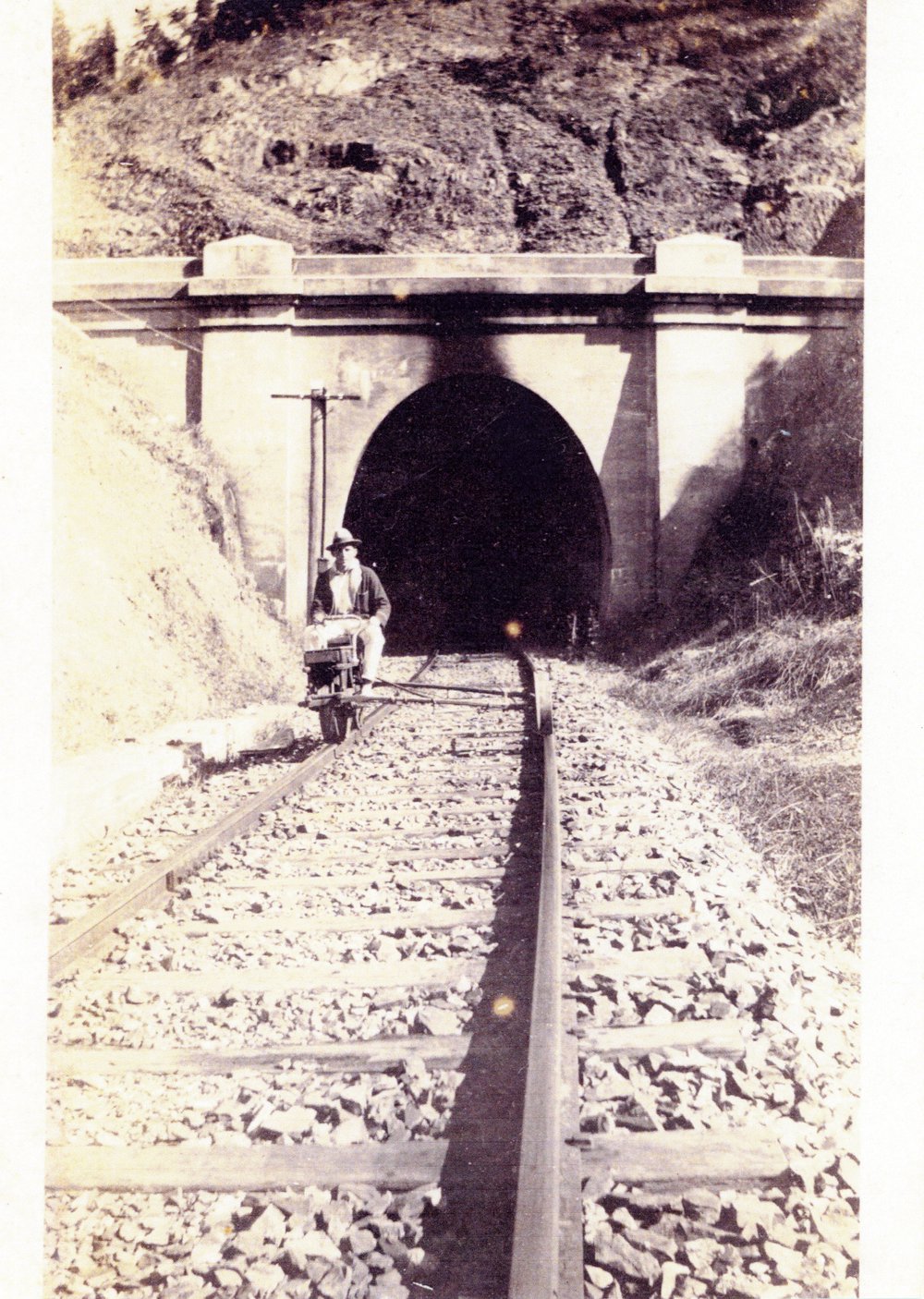 Reg Young emerging from the No. 2 tunnel between Karangi and Coffs Harbour, 1924