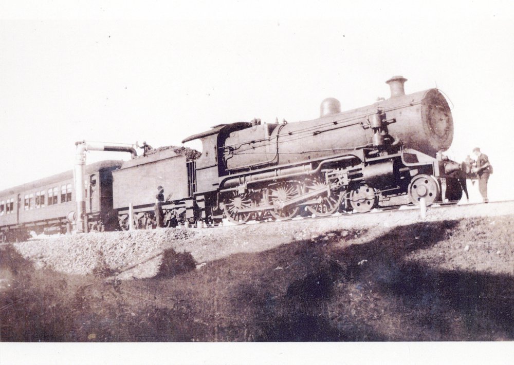 An express train takes on water, 1924