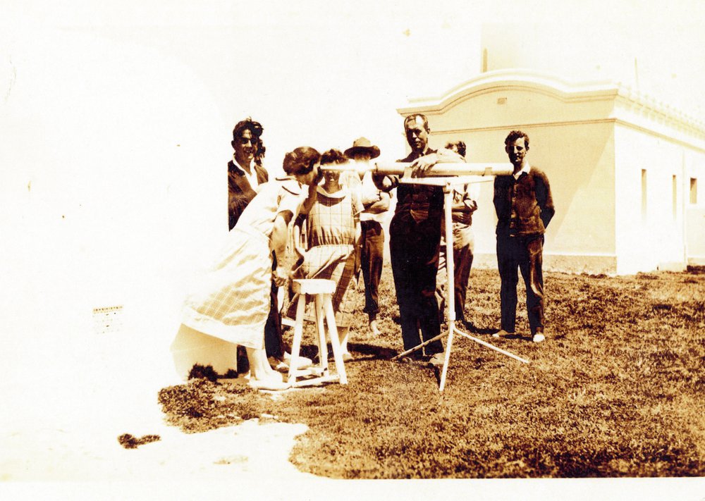 Looking through the telescope at South Solitary Island, 30 November 1924