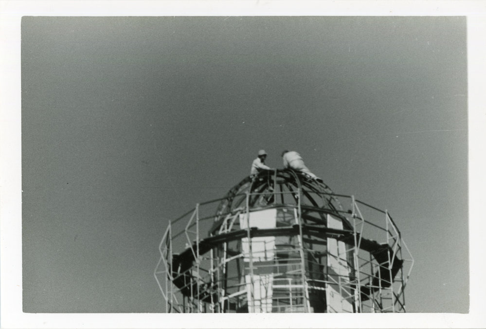 Scaffolding around the original Smoky Cape light during dismantling, 1977 