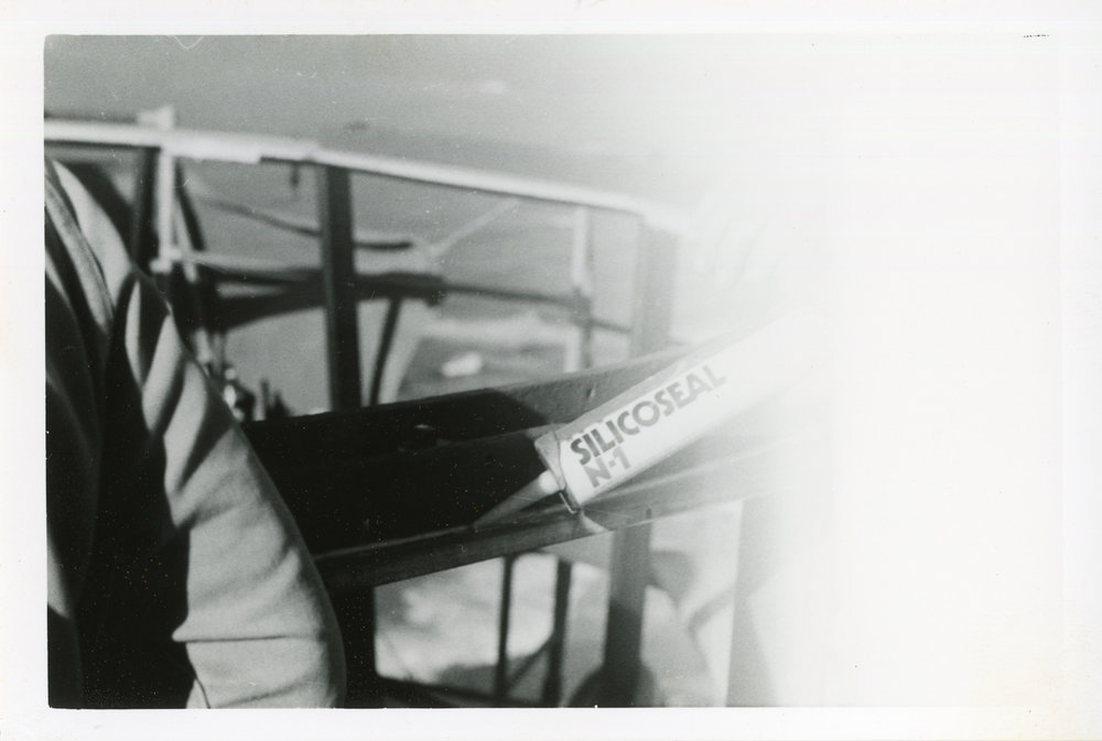 Using sealant at the Smoky Cape lighthouse, 1977 