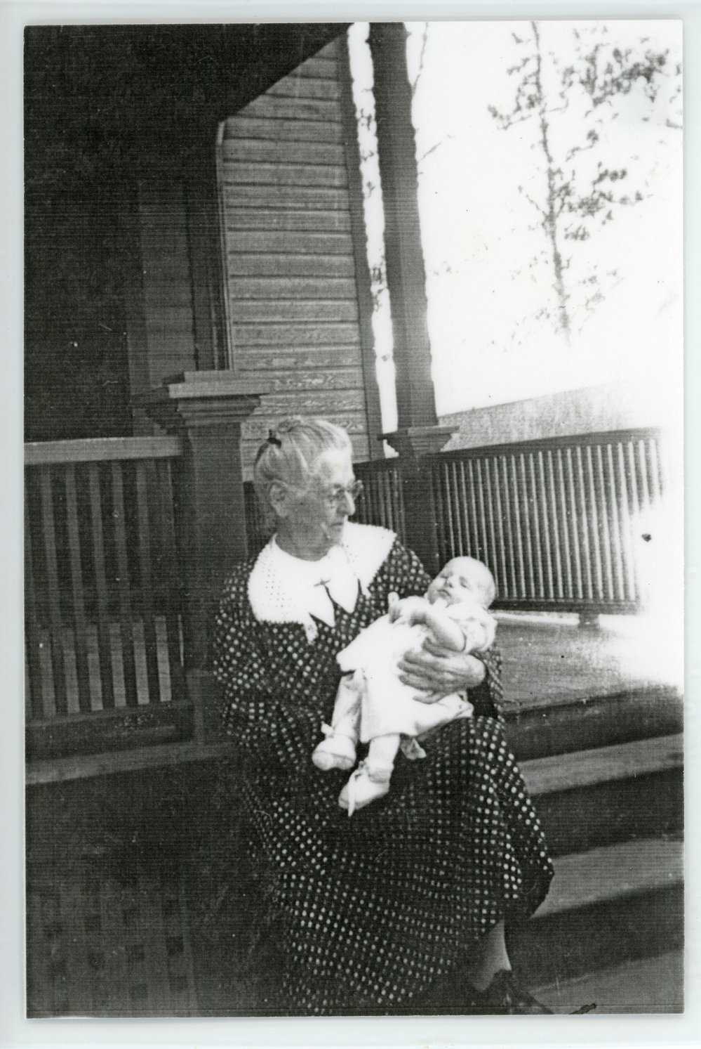 Portrait of grandmother with baby