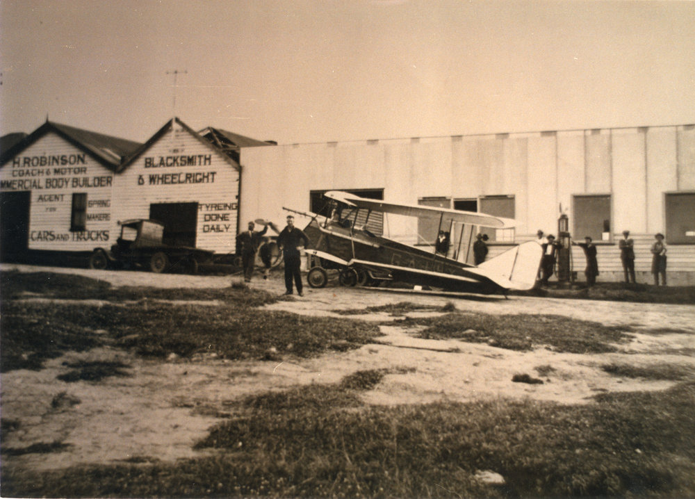 Pilot Rex Boyden's Gypsy Moth outside Harry Robinson's repair shop, 5 September 1928