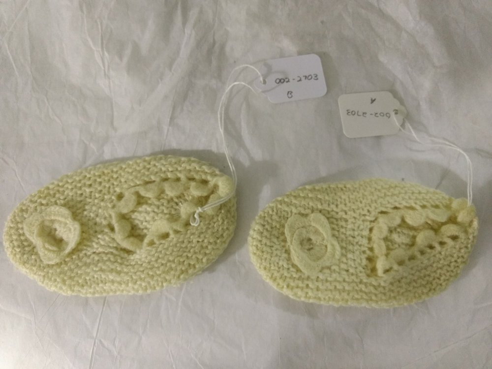 Pair of knitted baby's booties