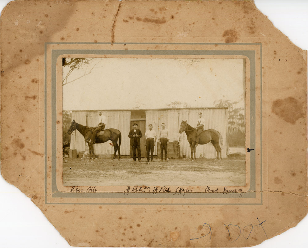 Railway construction workers outside a shed, c.1914