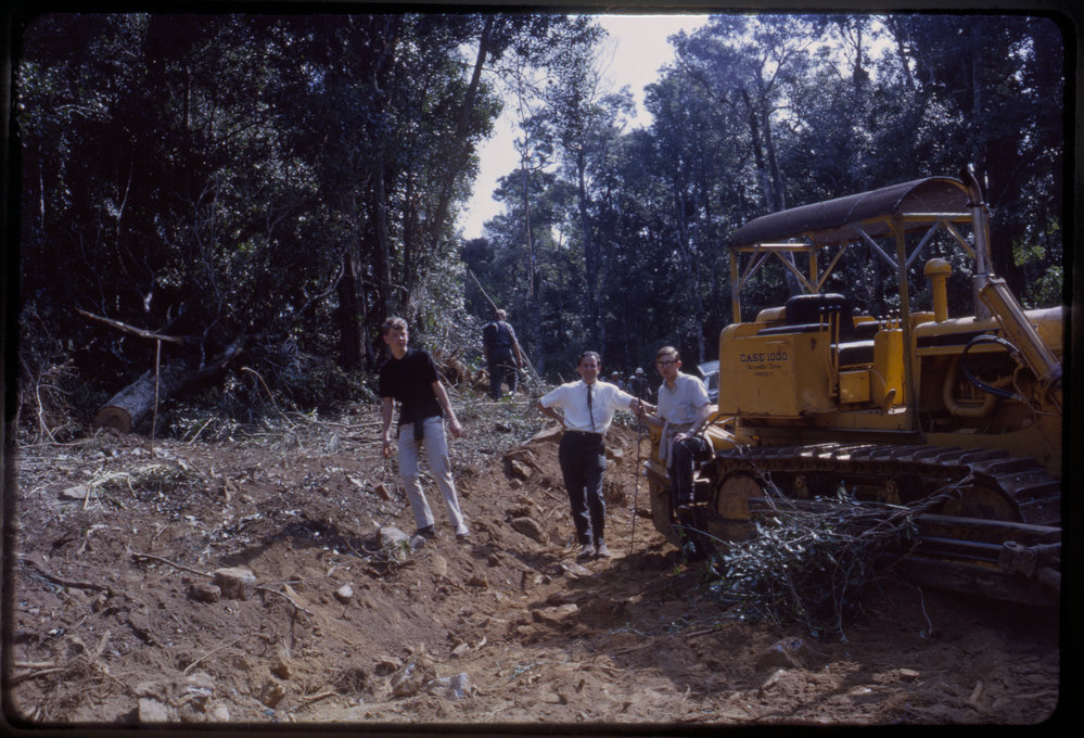 Three men and bulldozer, Mount Moombil, c. 1963