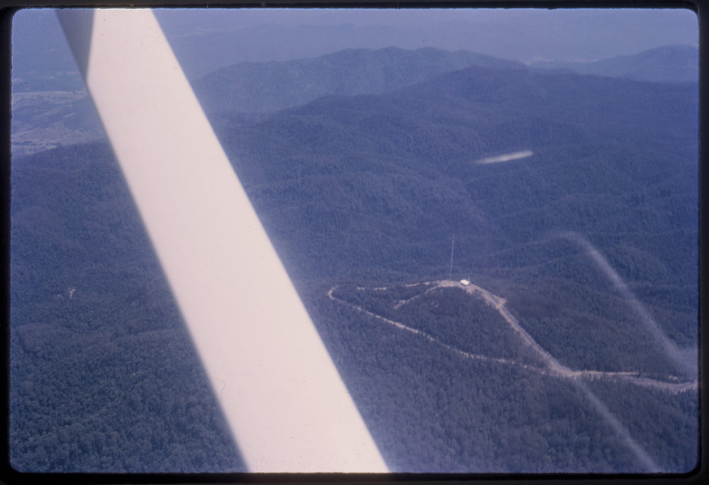 Aerial of transmission tower on Mount Moombil, c. 1964
