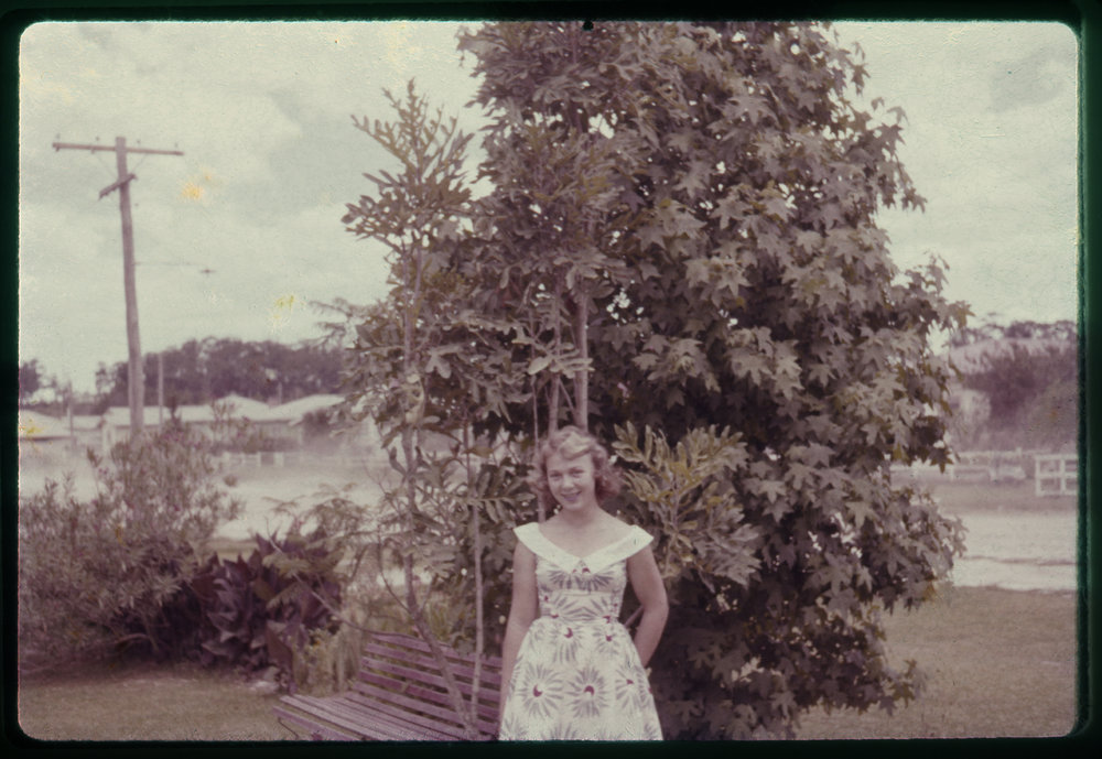 Woman in garden, c. 1960s