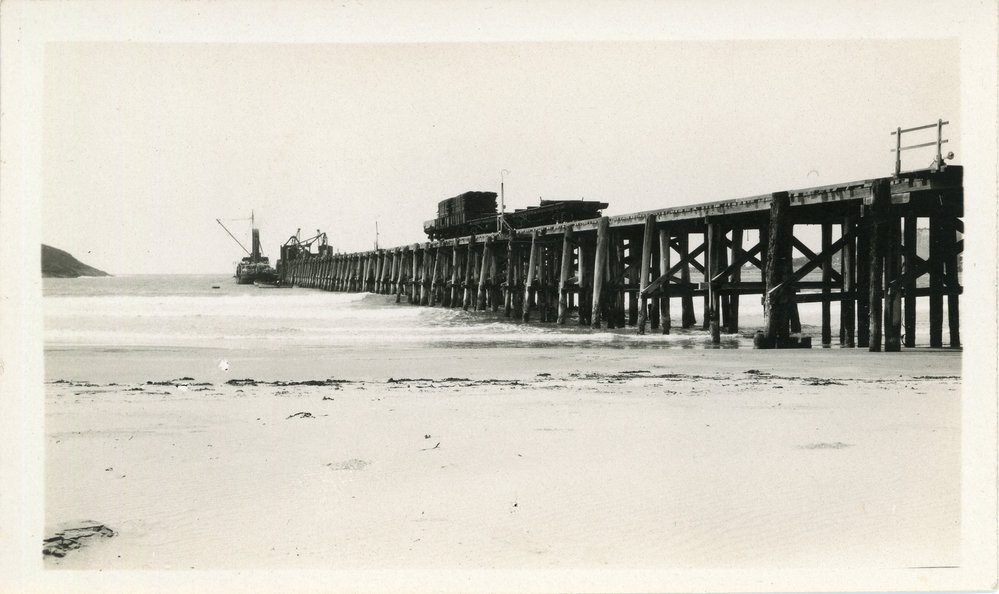 Timber transfer at the jetty, 1930s