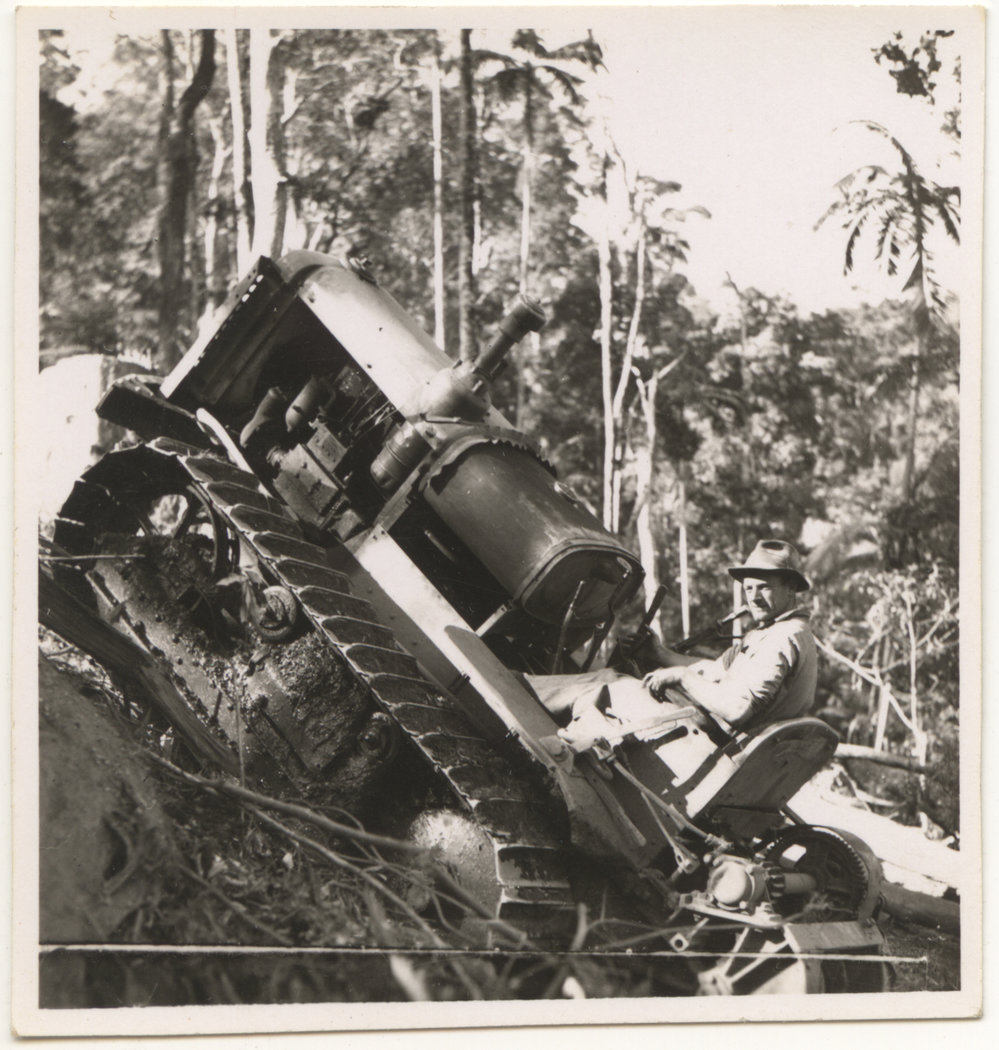 Tractor in rainforest, c. 1940s