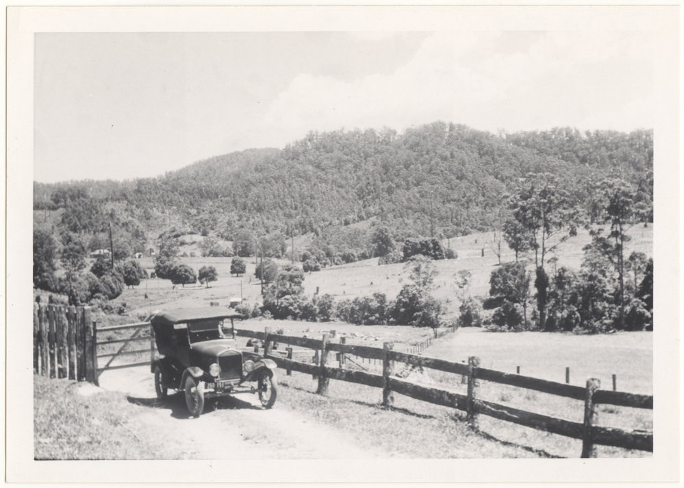 Arthur Anderson's Model T Ford at farm gate, c. 1940s