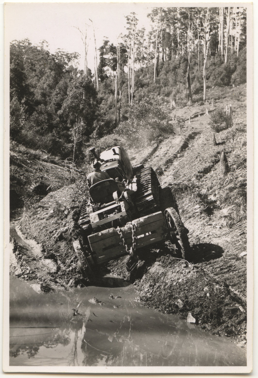 Tractor driving out of bog, c. 1940s