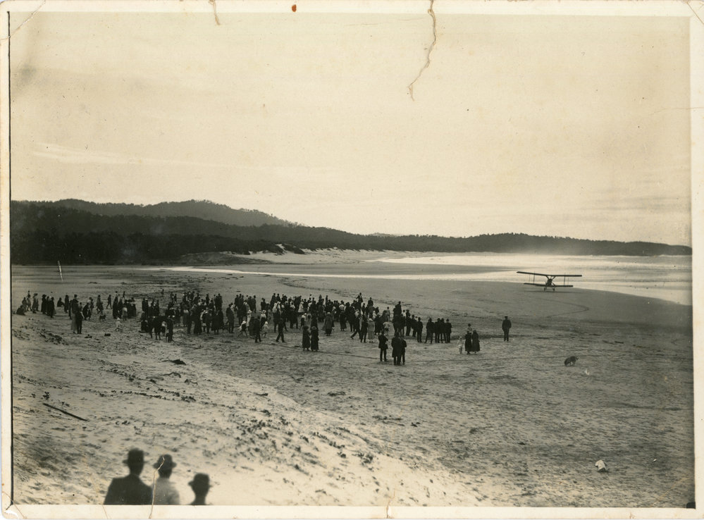 A plane lands on Jetty Beach, c. 1920 - 1922