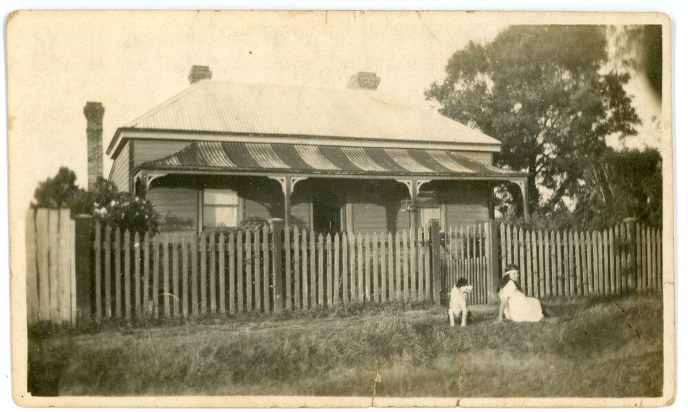 Home with dog and child, c.1920