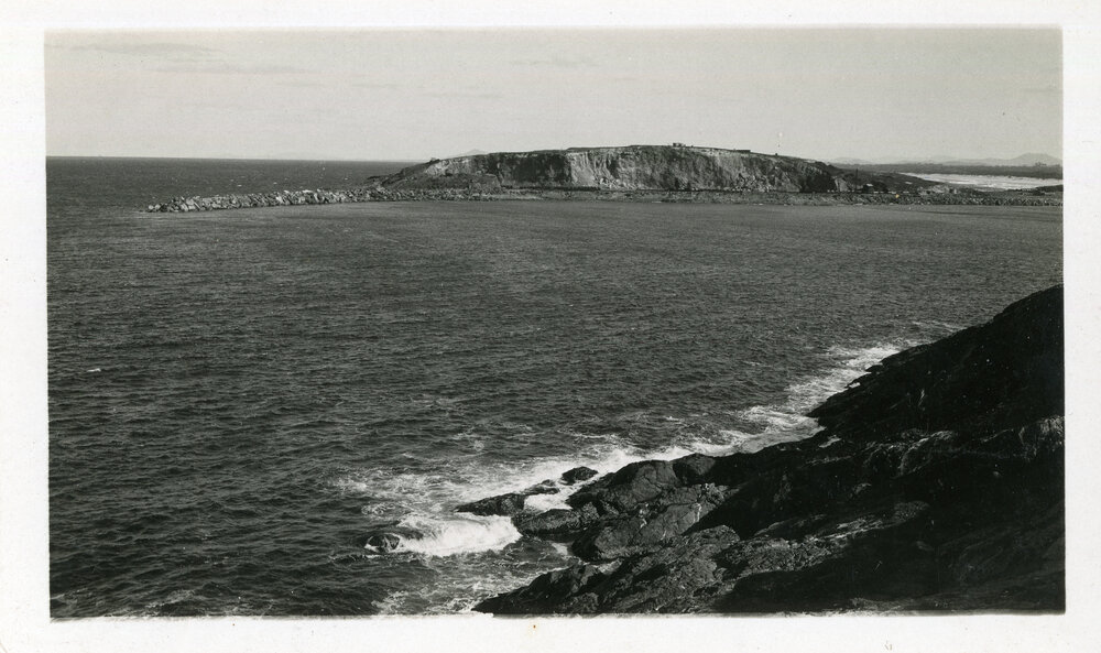 Eastern harbour breakwall and South Island quarry