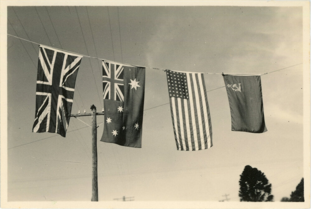 Flags commemorate the end of World War II, 15 August 1945